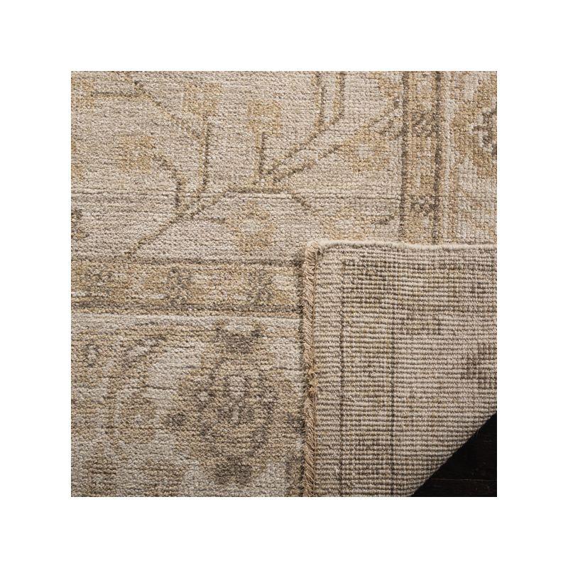Izmir IZM134 Hand Knotted Area Rug - Gold/Ivory - 9'x12' - Safavieh
