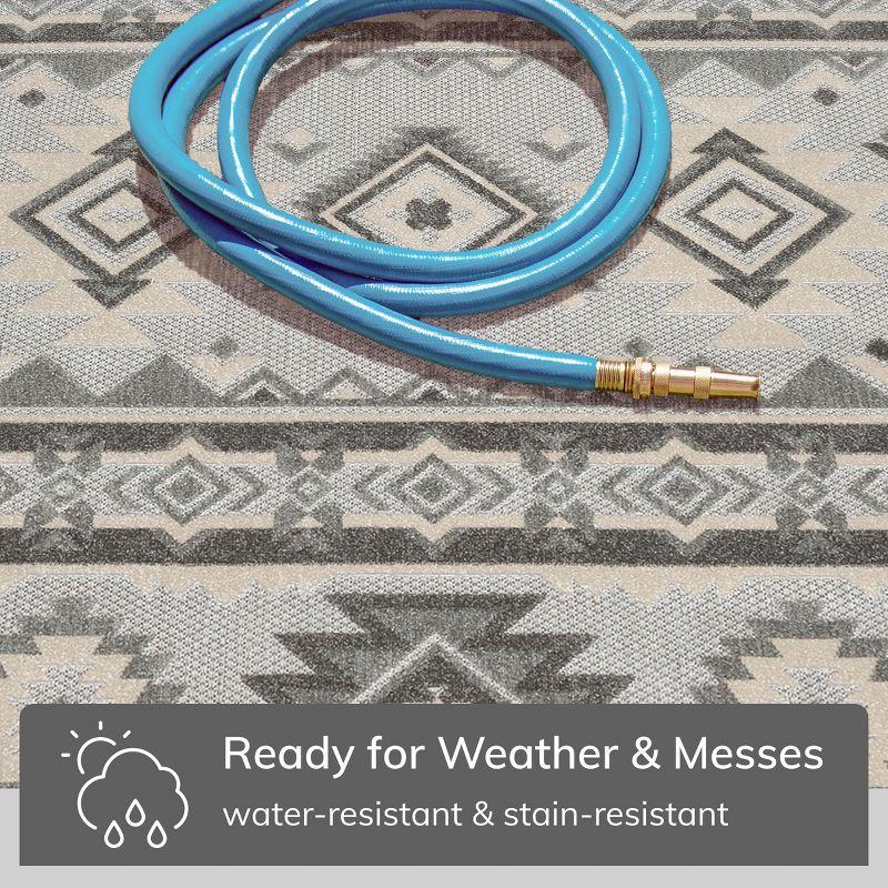 Ebern Designs Dickenson Mamba Geometric Grey Indoor/Outdoor Hi-Lo Area Rug