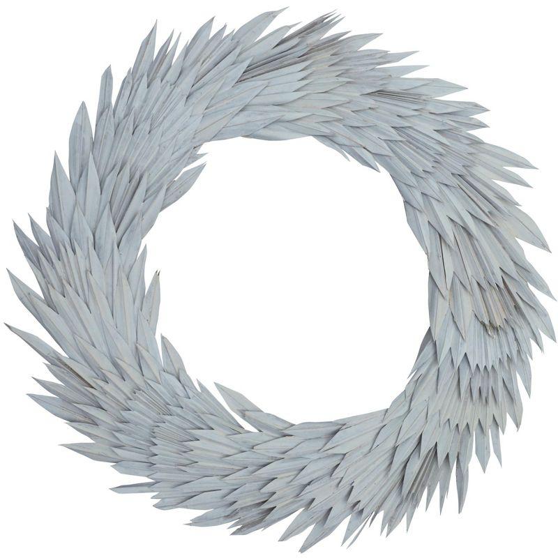 Vickerman Natural Botanicals 24" White Washed Palm Sun Wreath. This wreath measures 24 inches in diameter. It features white washed palm sun leaves on