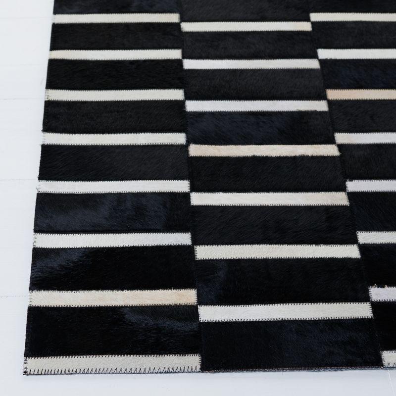 Geometric Hand-Knotted Black Cowhide 4' x 6' Area Rug