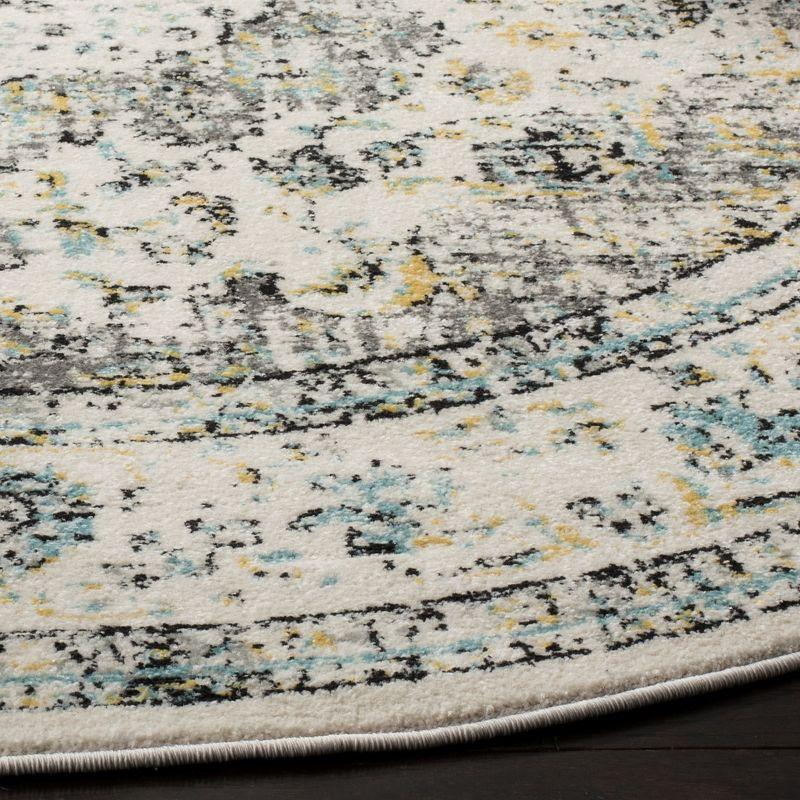 Chic Elegance 9' Round Grey and Gold Easy-Care Area Rug