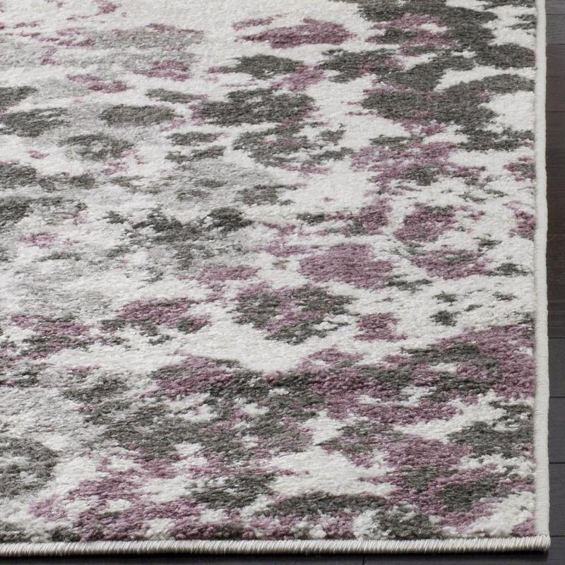 Ivory & Purple Floral Synthetic 5' x 7' Reversible Area Rug