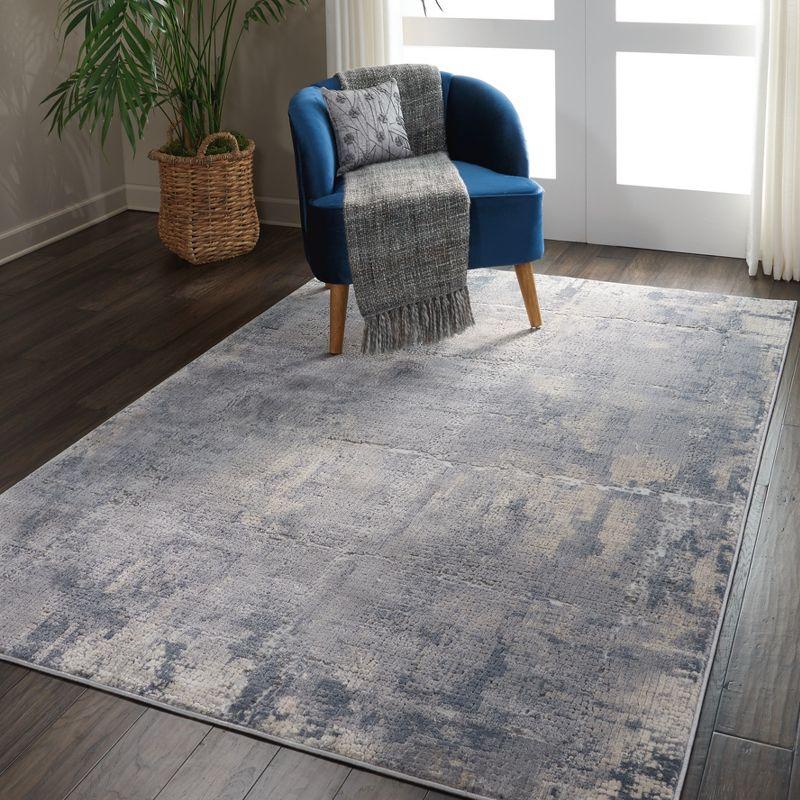 Abstract Grey and Beige Synthetic 5'3" x 7'3" Area Rug