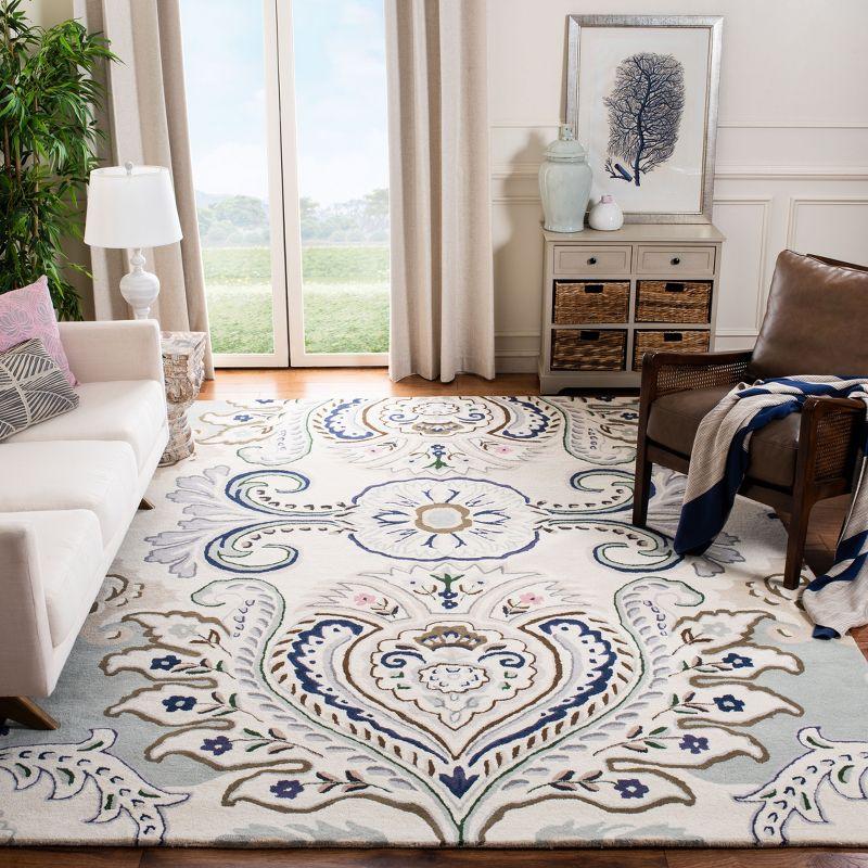 Ivory and Blue Hand-Tufted Wool 4' x 6' Area Rug