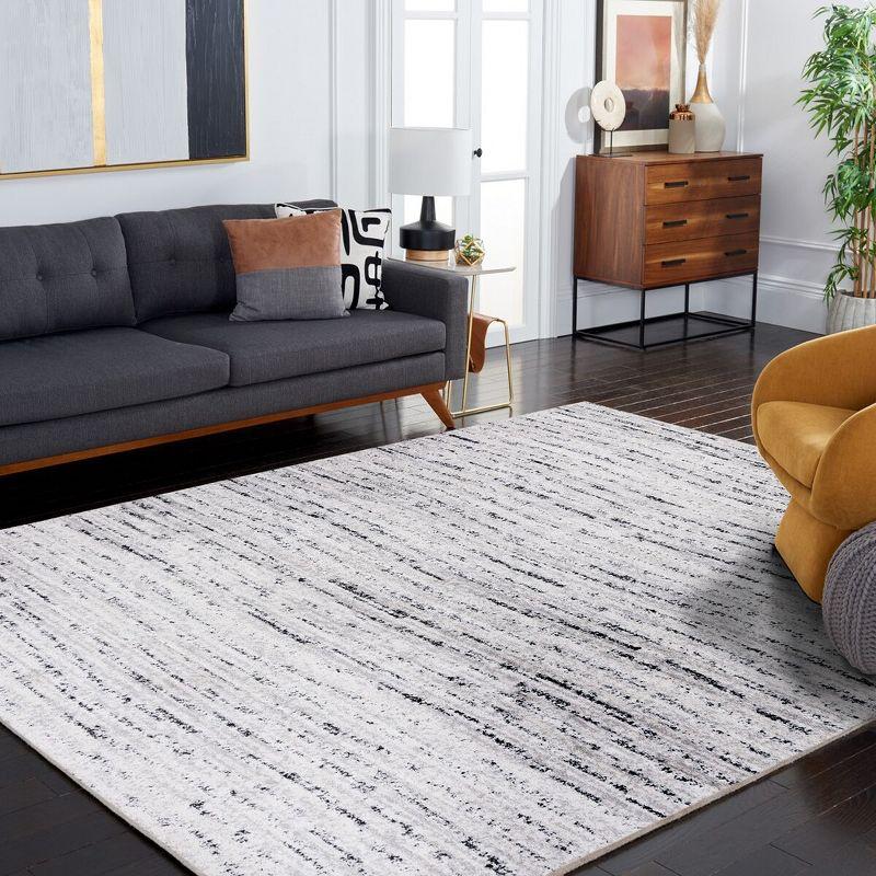 Ivory and Silver 8' x 10' Reversible Rectangular Area Rug