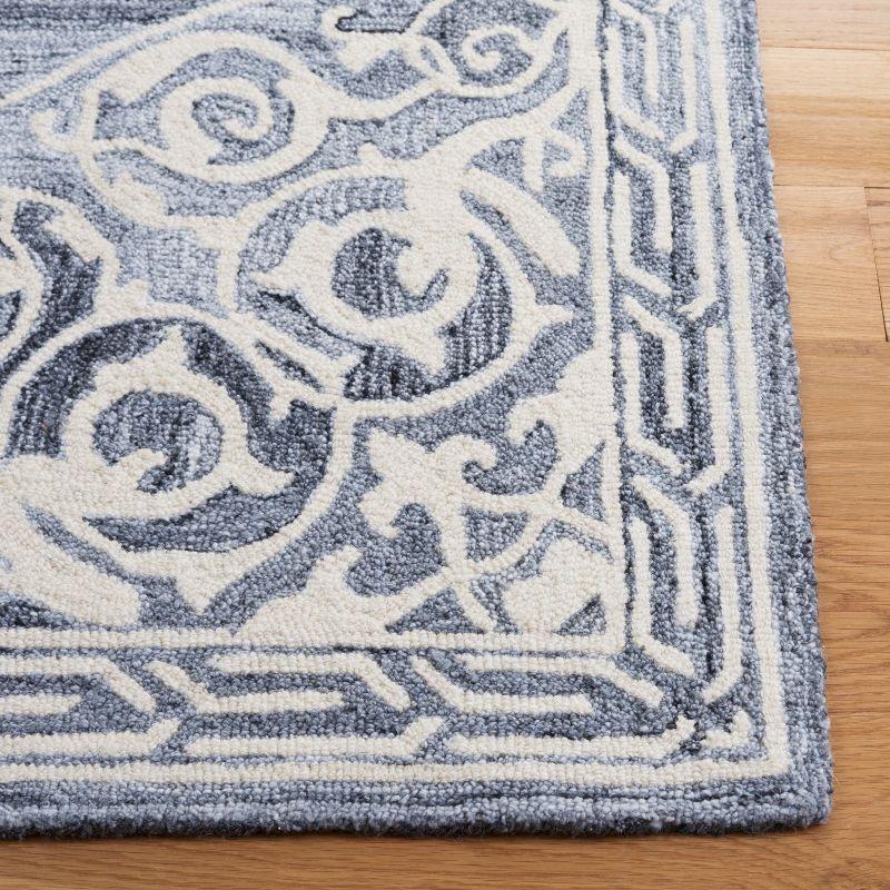 Metro MET983 Hand Tufted Area Rug  - Safavieh