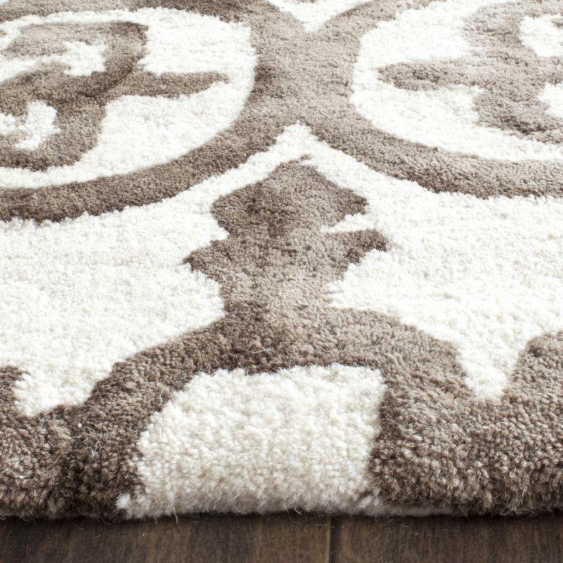 Hand-Tufted Ivory & Brown Wool Blend 6' x 9' Area Rug