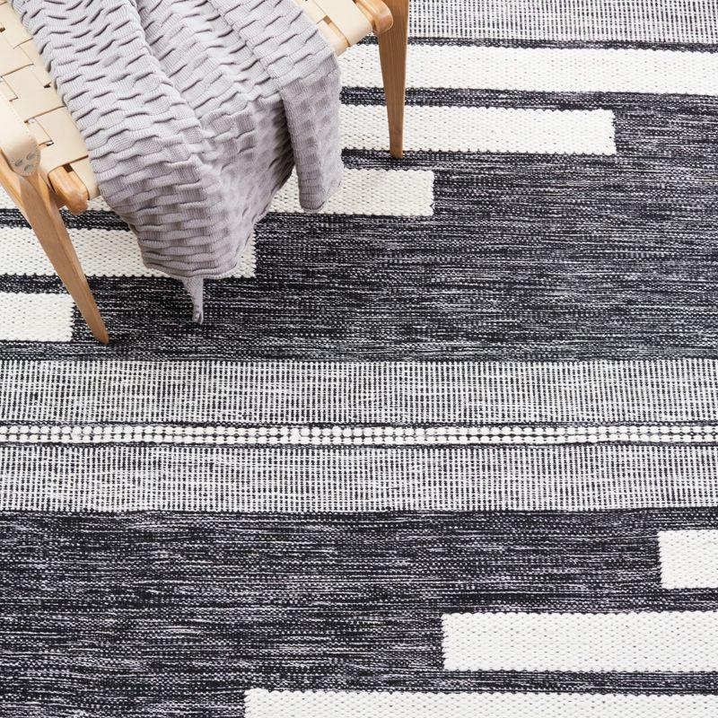 Bohemian Ivory and Black Handwoven Synthetic Stripe Area Rug 4' x 6'