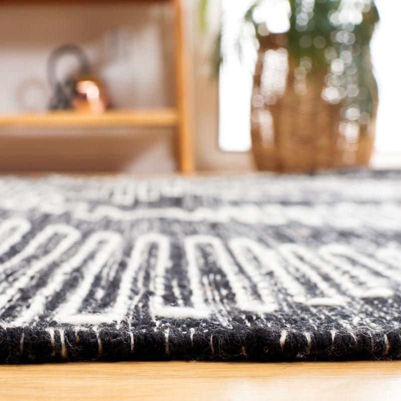 Bohemian Nomad Black & Ivory 4' x 6' Synthetic Area Rug