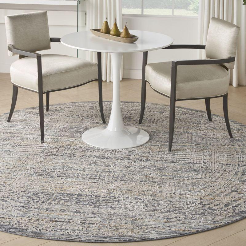 Nourison Nyle Boho Vintage Indoor Rug Ivory Slate 7’10” x Round