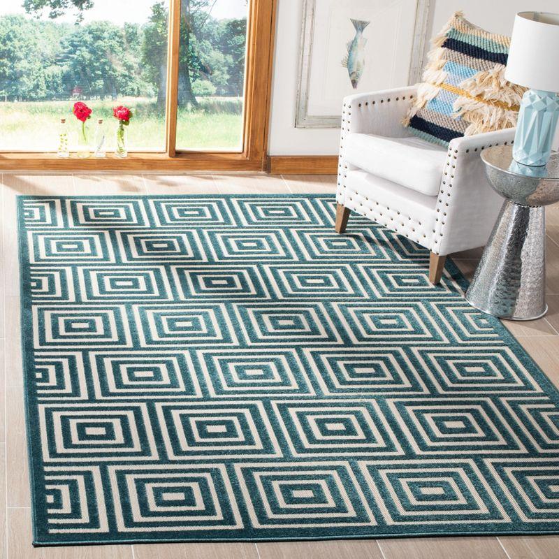 Cottage Elegance 79'' Cream & Turquoise Synthetic Area Rug