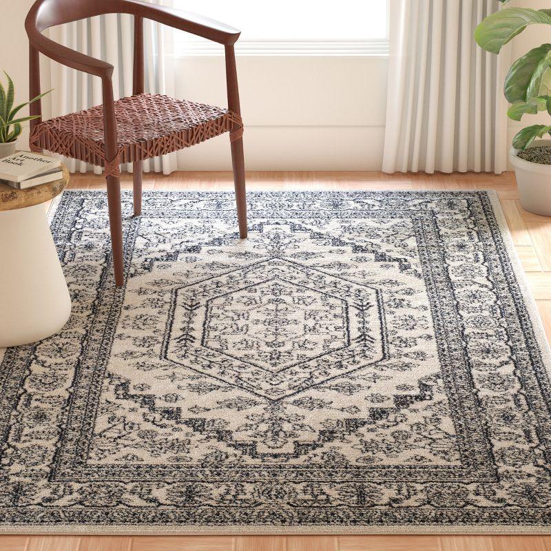 Navy and Ivory Hand-knotted Synthetic Circle Area Rug