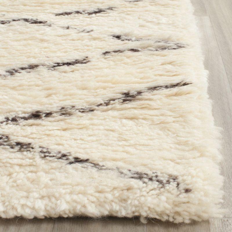 Ivory and Brown Hand-Tufted Wool Shag Area Rug 8' x 10'