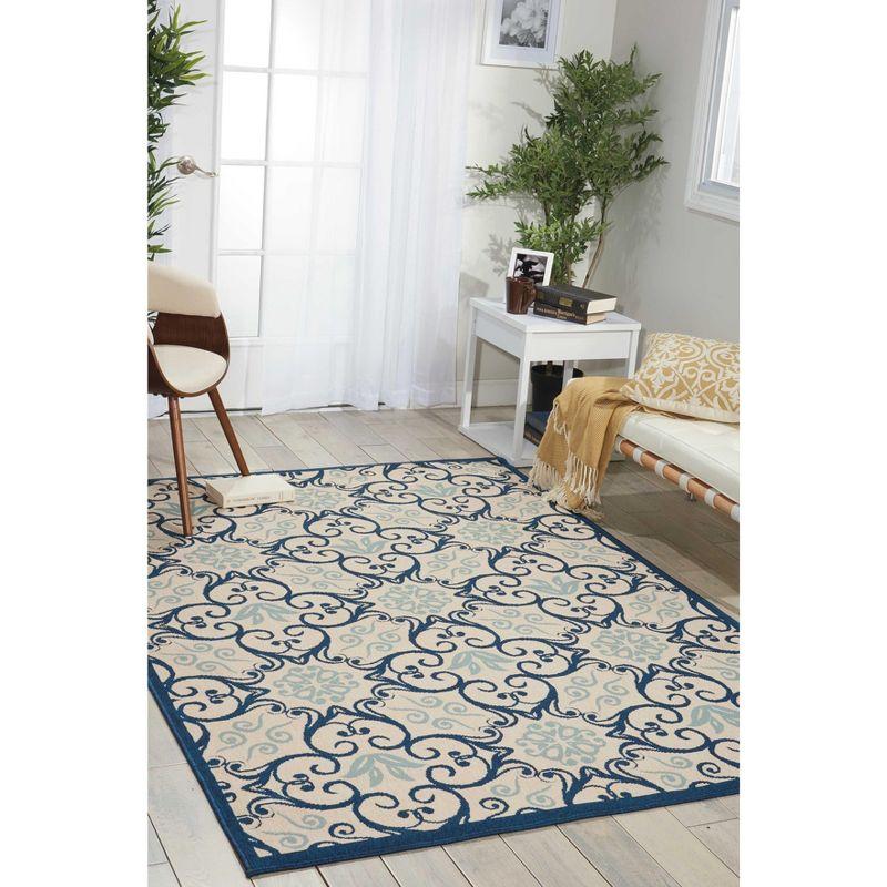 Ivory and Navy Floral Synthetic 5' x 7' Area Rug