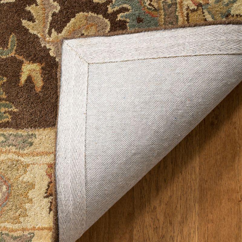 Hand-Tufted Woolen Area Rug in Brown/Ivory, 9' x 12'