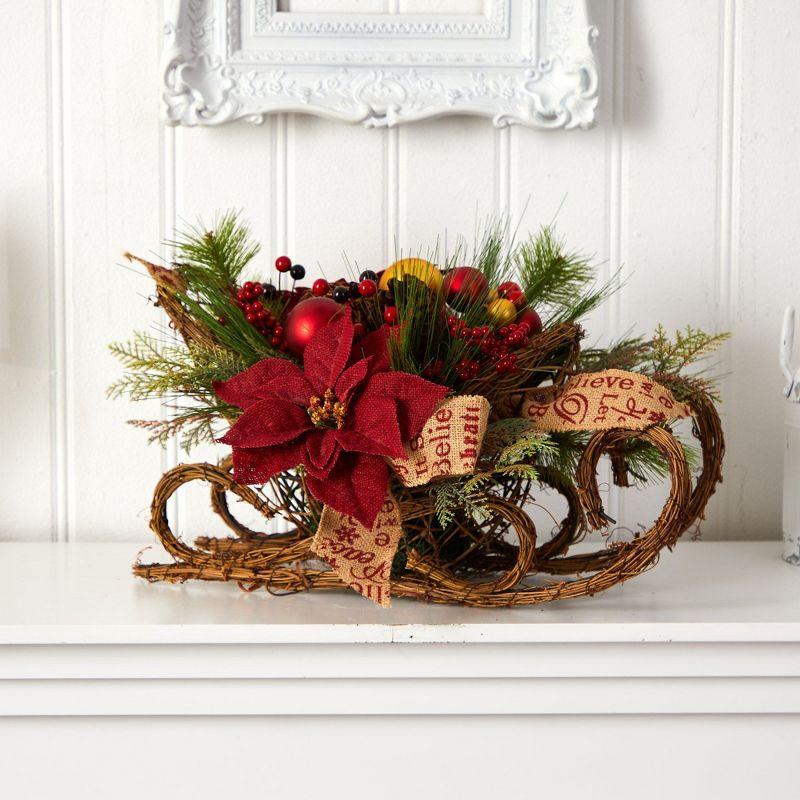 Nearly Natural 18-in Christmas Sleigh with Poinsettia, Berries and Pinecone Artificial Arrangement with Ornaments