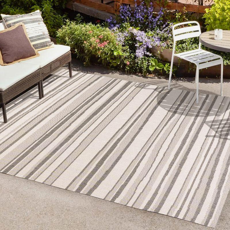 5' x 8' Castara Wavy Stripe Modern Indoor/Outdoor Area Rug, Cream/Dark Gray - JONATHAN Y