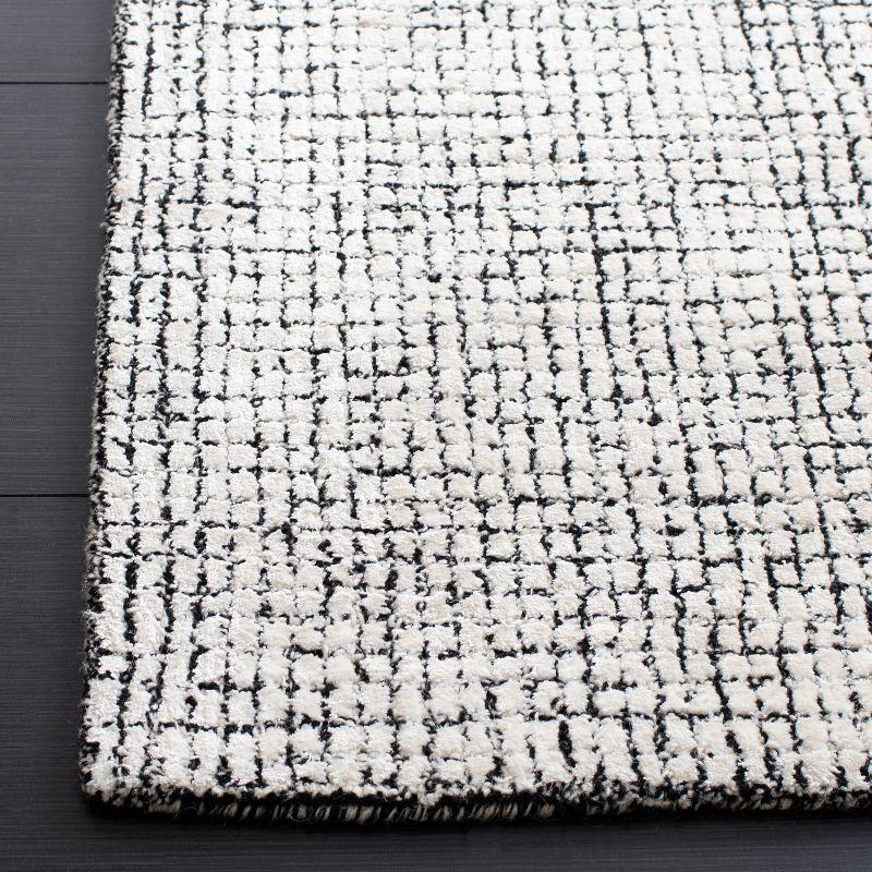 Handmade Abstract Ivory & Black Wool-Viscose 4' x 6' Area Rug