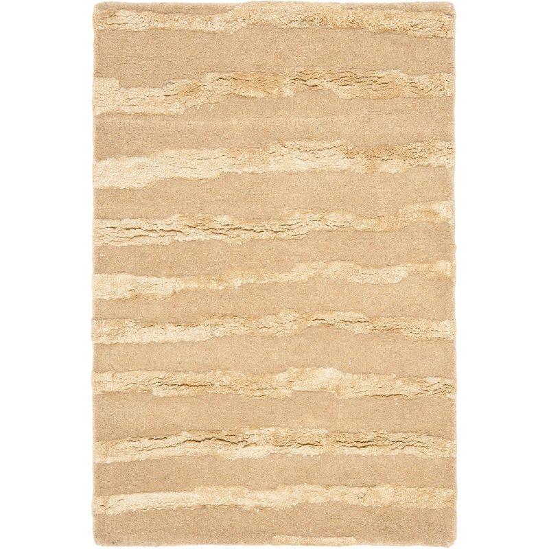 Beige and Gold 9' x 12' Tufted Wool and Viscose Rug