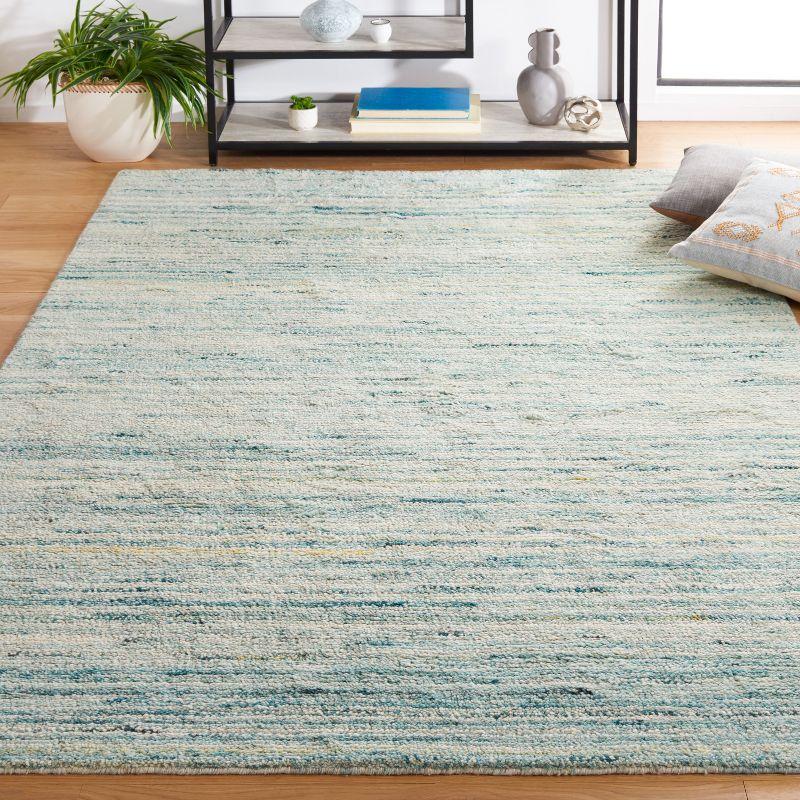 Turquoise and Ivory Handmade Wool Shag Area Rug, 3' x 5'