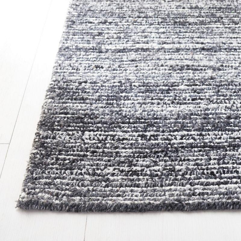 Elegant Dark Grey and Ivory Hand Tufted 6' Square Synthetic Rug