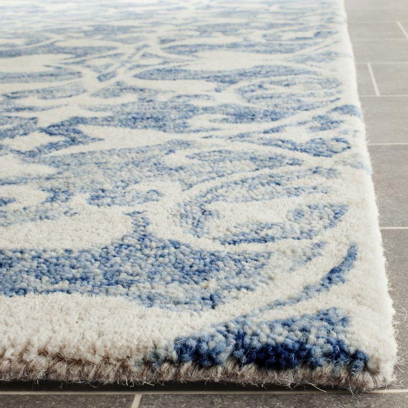 Ivory and Dark Blue Hand-Tufted Wool 4' x 6' Area Rug