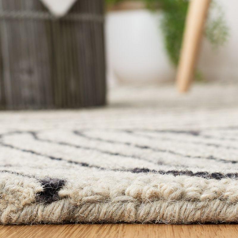 Metro MET451 Hand Tufted Indoor Accent Rug - Black/Ivory - 3'x5' - Safavieh