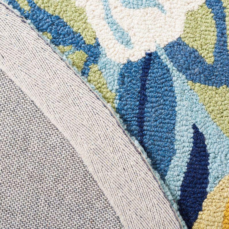Chelsea HK219 Hand Tufted Area Rug - Blue/Rose - 6'x9' Oval - Safavieh.