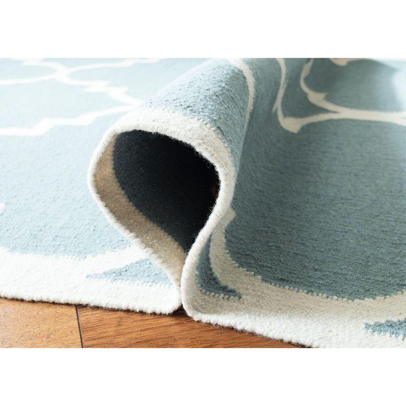 Ivory and Light Blue Geometric Wool Area Rug, 6' x 9'