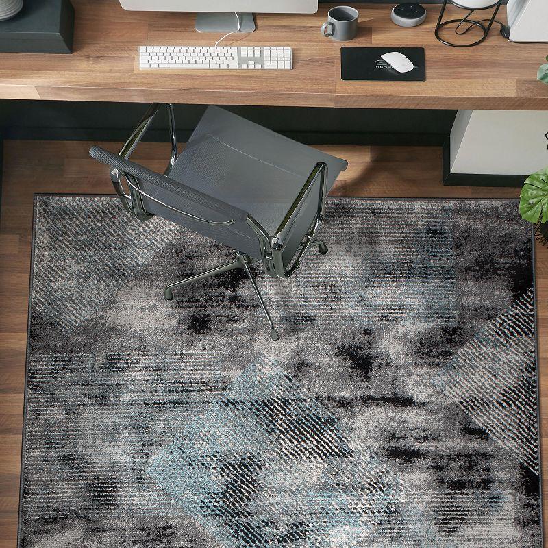 Reversible Geometric Black Synthetic 5' x 7' Area Rug