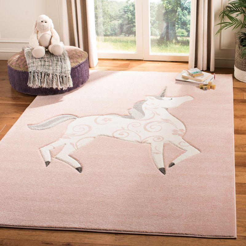 Enchanted Carousel 47" Round Pink/Ivory Synthetic Kids Area Rug