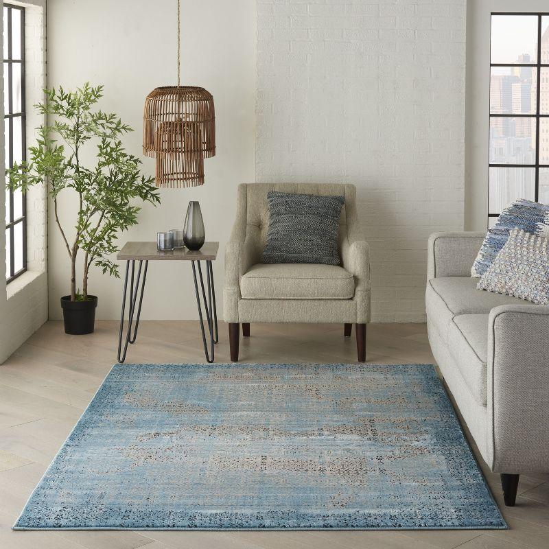 Blue 5' x 7' Stain-Resistant Synthetic Rectangular Area Rug