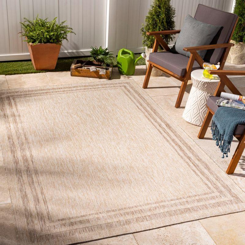 Ivory Rectangular Stain-Resistant Synthetic Area Rug 6'7" x 9'