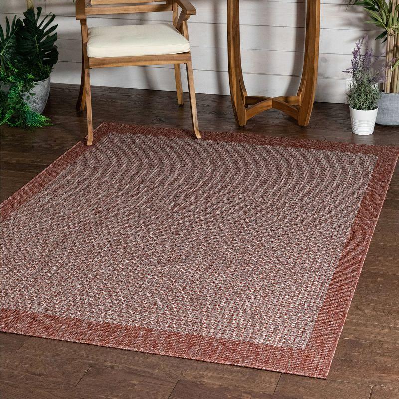 Marshanna Odin Solid Striped Border Indoor Outdoor Coral Flatweave Rug