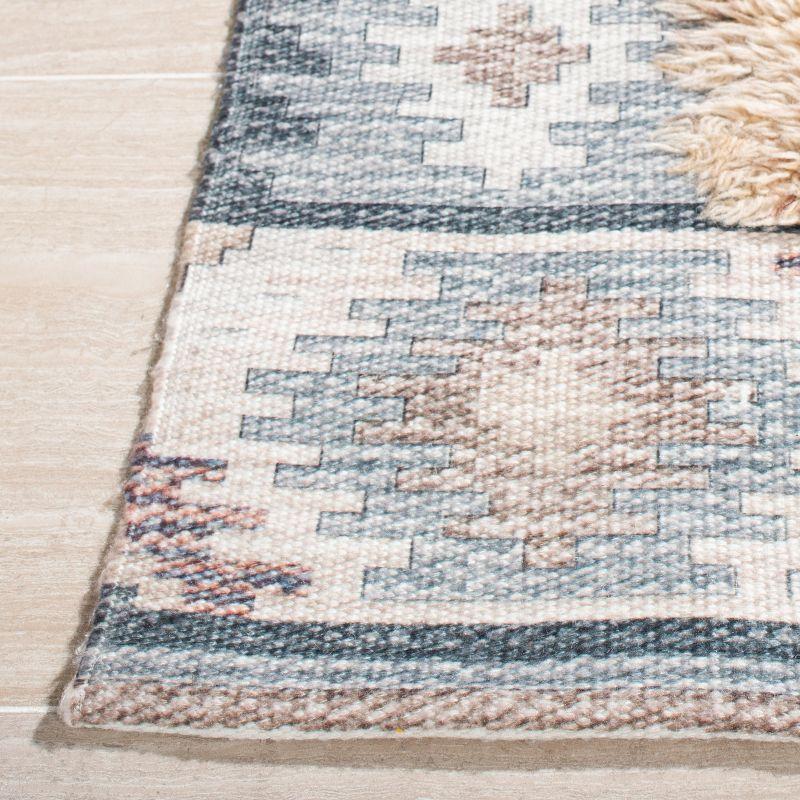 Ivory and Taupe Hand Loomed Wool Area Rug