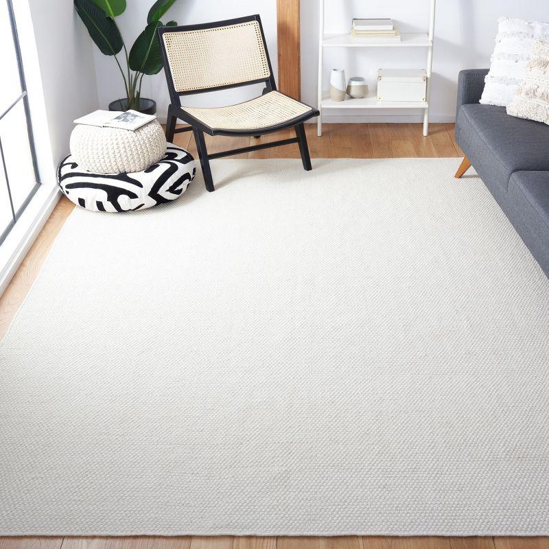 Opperman Hand Tufted Solid Color Rug