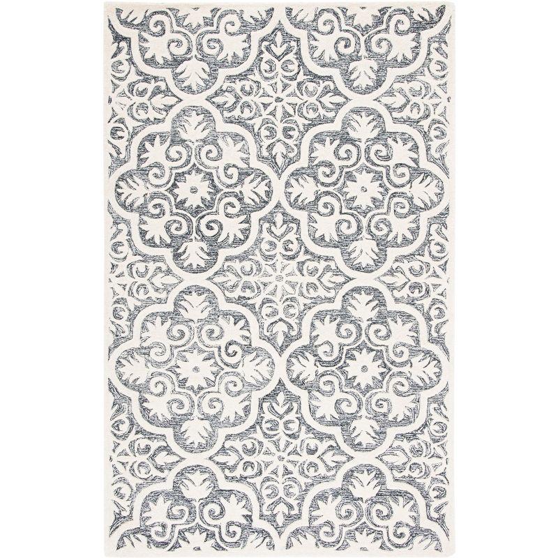 Metro MET859 Hand Tufted Indoor Area Rug - Black/Ivory - 8'x10' - Safavieh