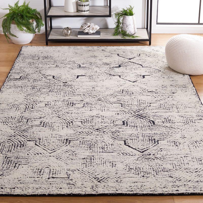 Metro MET480 Hand Tufted Area Rug  - Safavieh