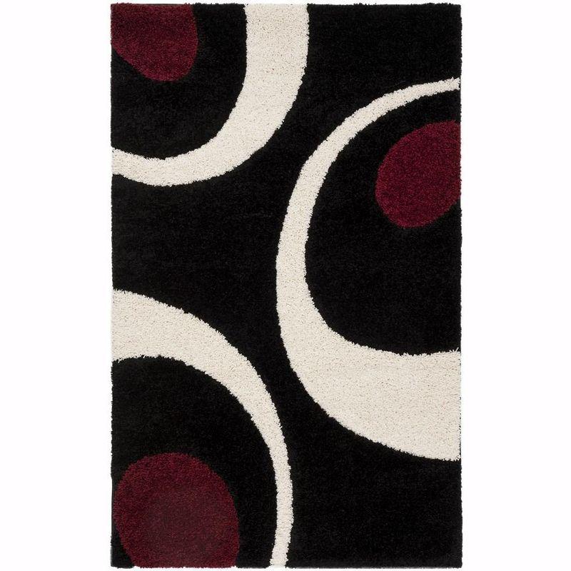 Handmade Tufted Black/Ivory Synthetic Shag Rug, 4x6 Feet