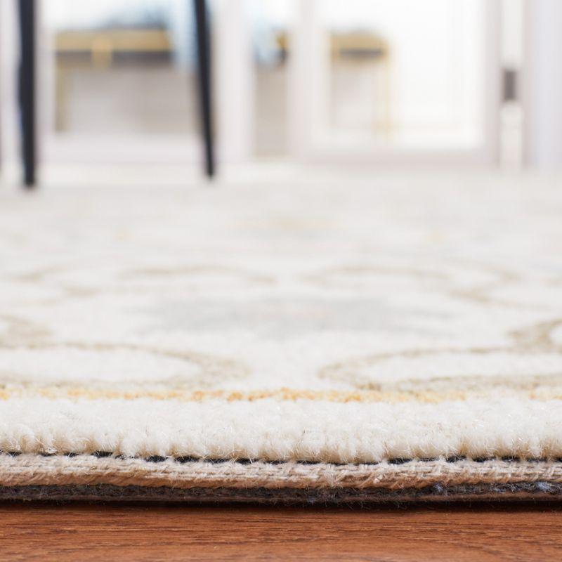 Hololive Ivory/Grey Hand-Tufted Wool Medallion Area Rug