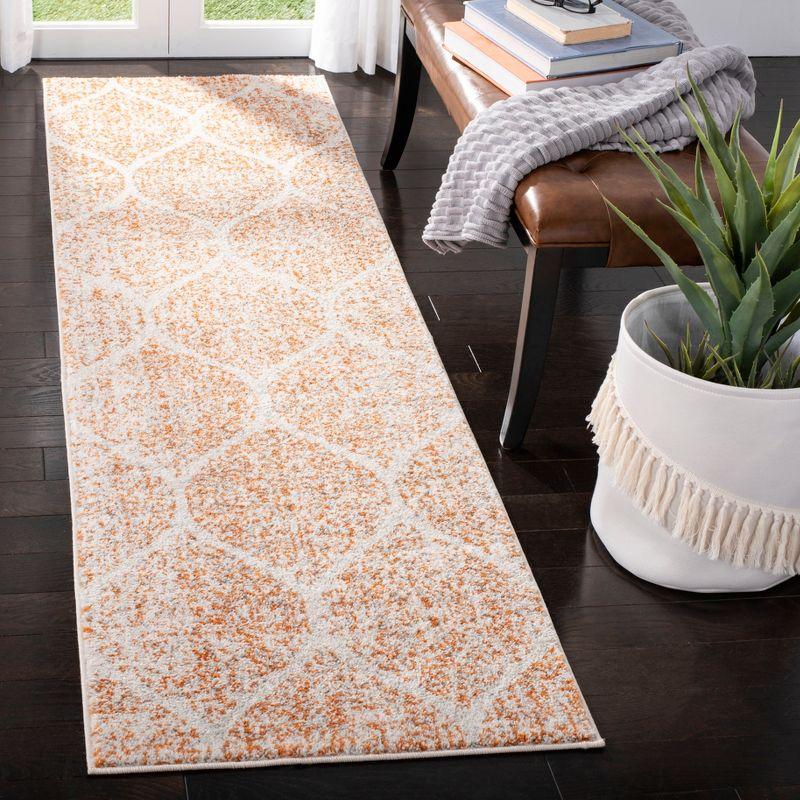 Metro-Mod Cream & Orange Synthetic 27" Easy-Care Area Rug