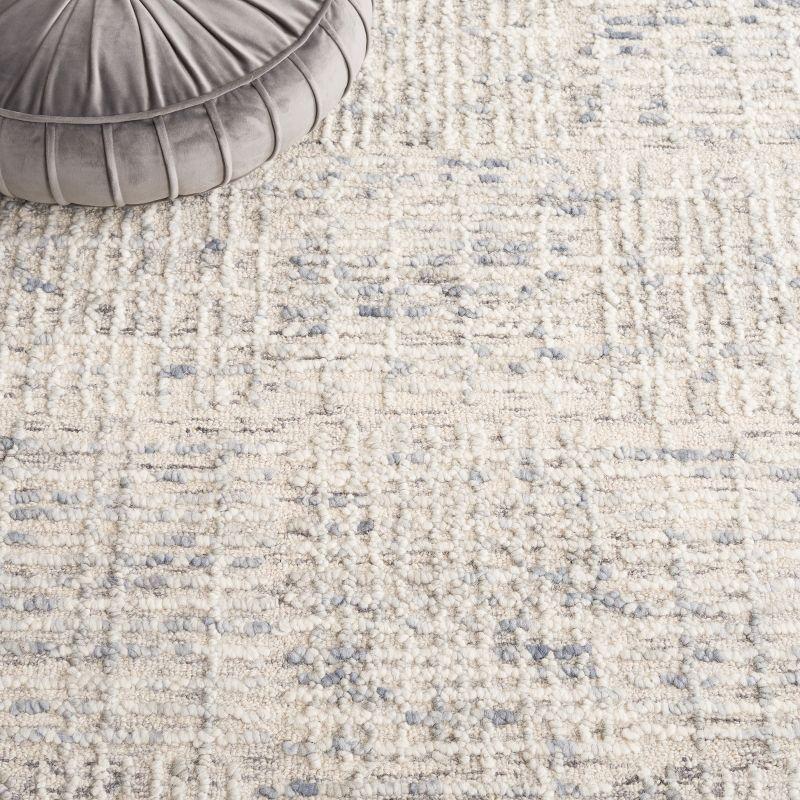 Abstract ABT275 Handmade Tufted Area Rug - Light Blue/Ivory - 5'-0" x 8'-0" - Safavieh