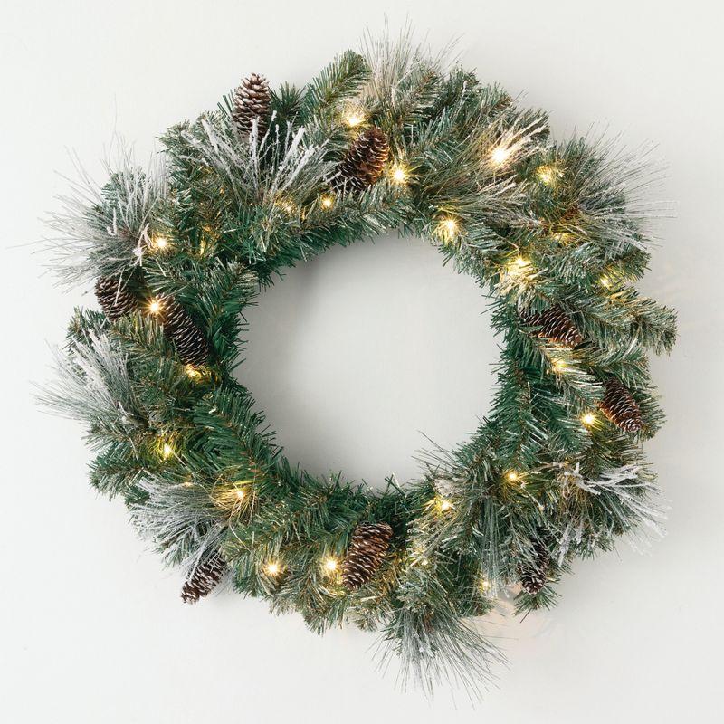 24-Inch Pre-Lit Flocked Pine Christmas Wreath with Pinecones and Gold Accents