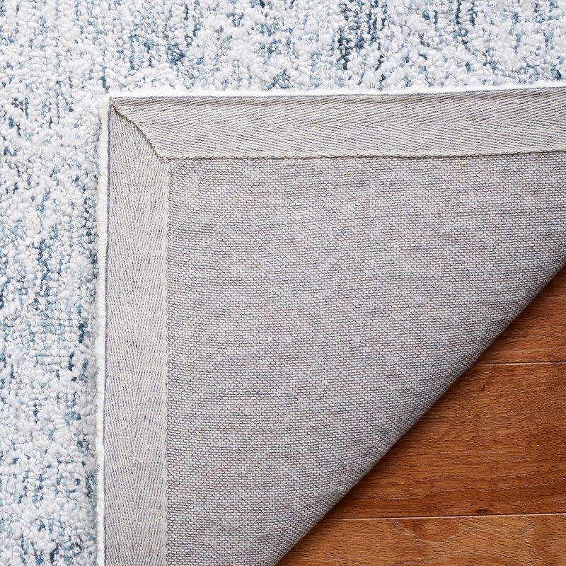 Light Blue Hand Tufted Wool and Synthetic Area Rug, 4' x 6'