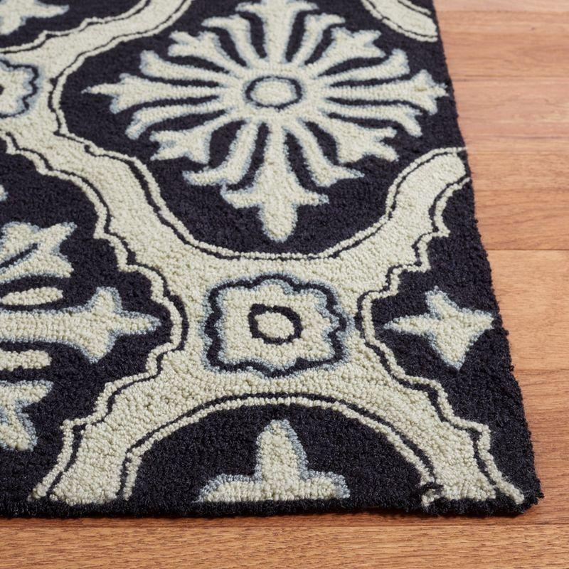 Taran Easy Care Hand Hooked Performance Geometric Rug