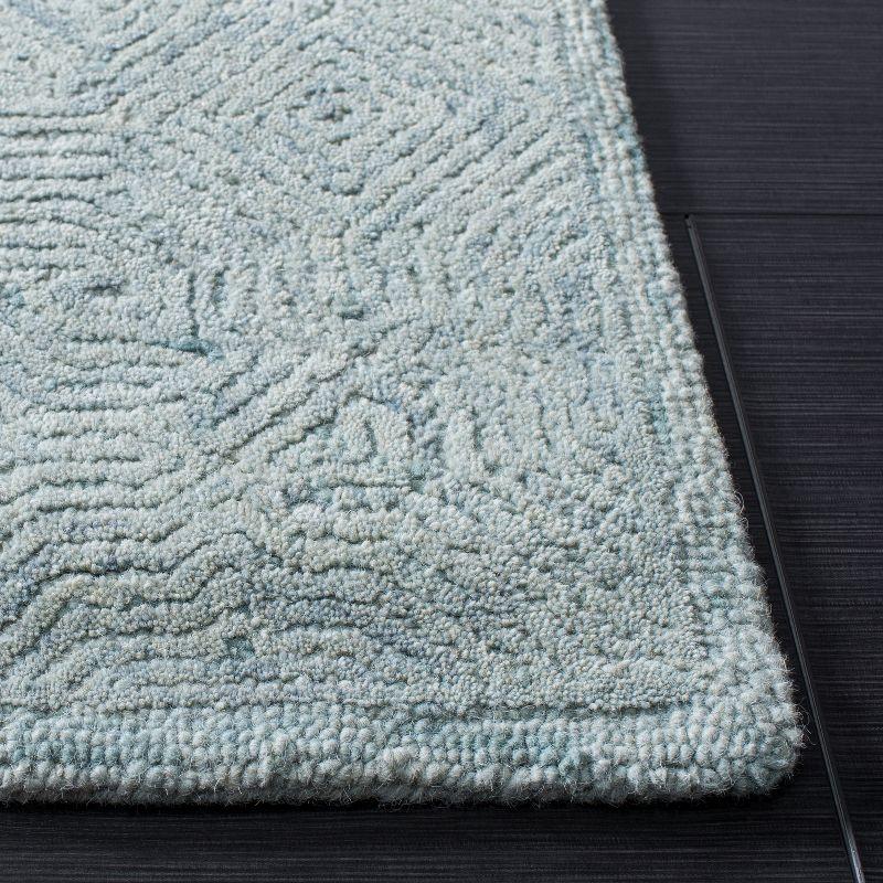 Ikat IKT506 Hand Tufted Area Rug - Aqua - 8'x10' - Safavieh