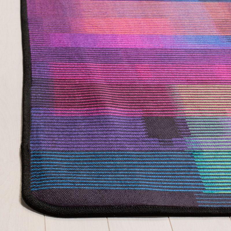 Black and Fuchsia Abstract Synthetic Area Rug 4' x 6'