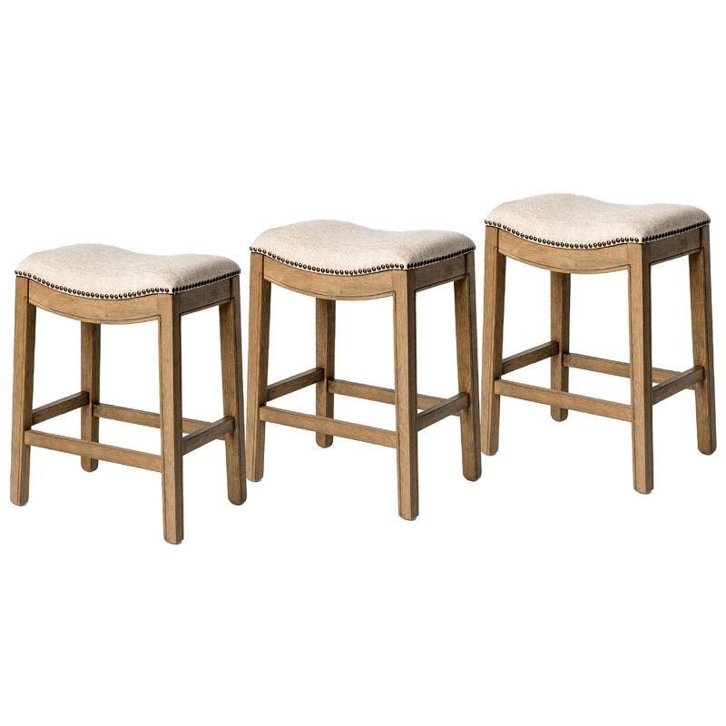 Maven Lane Adrien 26 Inch Counter Height Upholstered Backless Saddle Barstool in Natural Wood Finish with Wheat Cream Fabric Cushion Seat, Set of 3