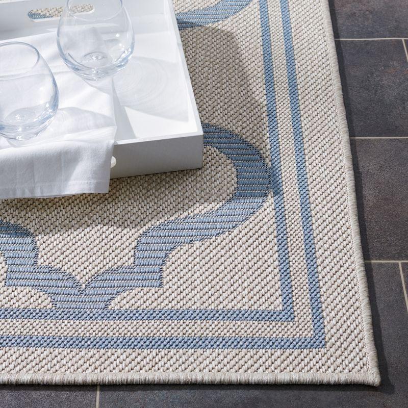Bermuda BMU810 Power Loomed Indoor/Outdoor Machine Washable Area Rug - Ivory/Blue - 6'7"x9'2" - Safavieh