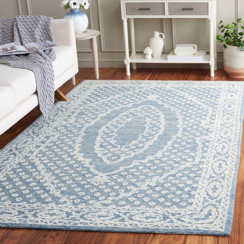 Ivory and Navy Tufted Handmade Wool Area Rug, 6' x 9'